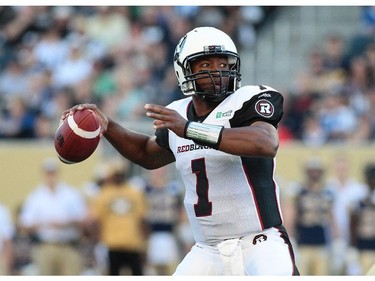 Henry Burris #1 of the Ottawa RedBlacks prepares to throw the ball in first half action in a CFL game against the Winnipeg Blue Bombers at Investors Group Field on July 3, 2014 in Winnipeg, Manitoba, Canada.