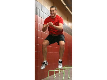 Ottawa Senators' NHL prospect Alexander Guptill clears a hurdle during their annual development camp at Canadian Tire Centre in Ottawa on July 03, 2014.