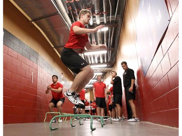 Ottawa Senators' NHL prospect Matt Murphy jumps a hurdle during their annual development camp at Canadian Tire Centre in Ottawa on July 03, 2014.