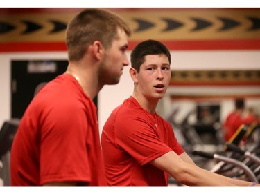 Ottawa Senators' NHL prospects Shane Eiserman (L) and Miles Gendron (R)  chat during their annual development camp at Canadian Tire Centre in Ottawa on July 03, 2014.
