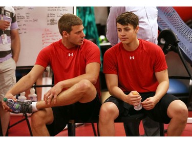 Ottawa Senators' NHL prospects Vincent Dunn (L) and Tomas Kral (R) chat during their annual development camp at Canadian Tire Centre in Ottawa on July 03, 2014.