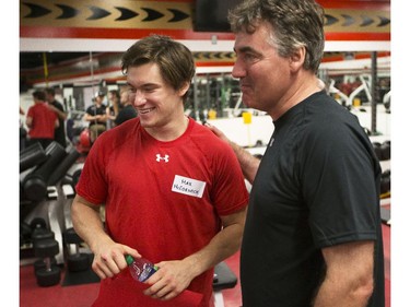 Ottawa Senators' prospect Max McCormick, left, talks with development coach, Shawn Camp, during the 2014 Development Camp at the Canadian Tire Centre Tuesday, July 1, 2014.