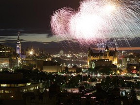 Fireworks light up the night sky and cap off Canada Day celebrations in the nation’s capital on Tuesday.