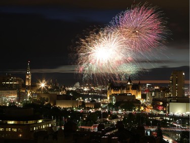 Fireworks light up the night sky and cap off Canada Day celebrations in the nation’s capital on Tuesday.