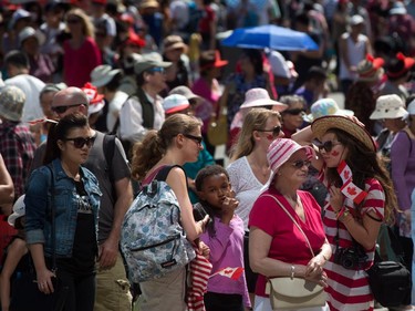 People crowd the streets around Canada Place during Canada Day celebrations in Vancouver, B.C., on Tuesday July 1, 2014.
