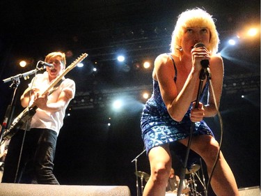 Peter Dreimanis and Leah Fay, from July Talk, perform Friday night, July 11, 2014,  at Bluesfest in LeBreton Flats, Ottawa.