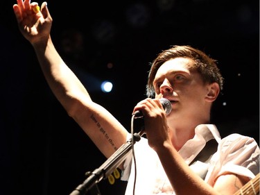 Peter Dreimanis and Leah Fay, from July Talk, perform Friday night, July 11, 2014,  at Bluesfest in LeBreton Flats, Ottawa.