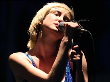 Peter Dreimanis and Leah Fay, from July Talk, perform Friday night, July 11, 2014,  at Bluesfest in LeBreton Flats, Ottawa.