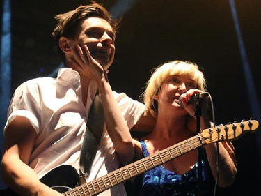 Peter Dreimanis and Leah Fay, from July Talk, perform Friday night, July 11, 2014,  at Bluesfest in LeBreton Flats, Ottawa.