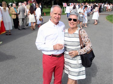 Peter Froislie breaks out the red pants to attend the U.S. Embassy's annual Independence Day party on Friday, July 4, 2014, with his wife, Jayne Watson, CEO of the National Arts Centre Foundation.