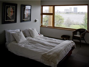 The master bedroom looks out through the treetops to Tunney’s Pasture on the Ottawa side of the river.