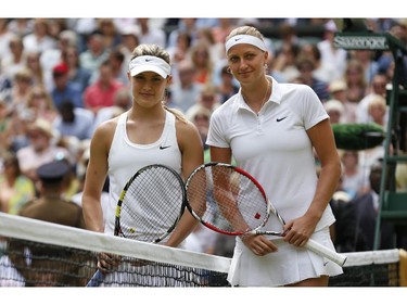 Petra Kvitova of the Czech Republic, right, and Eugenie Bouchard of Canada, left, pose for photographers before their women's singles final at the All England Lawn Tennis Championships in Wimbledon, London, Saturday, July 5, 2014.