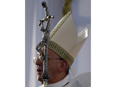 Pope Francis celebrates a mass in Caserta, Italy, Saturday, July 26, 2014. Francis made a late-afternoon visit Saturday to Caserta, the main town in the turf of the Casalesi crime clan of the Naples-area Camorra syndicate. During his homily outside the 18th-century Reggia palace, Caserta's main tourist attraction, Francis drew applause when he urged his flock to have "the courage to say no to every form of corruption and lawlessness."