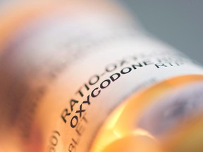 Prescription pill bottle containing oxycodone and acetaminophen are shown in this June 20, 2012 photo. The rate of fatal overdoses from opioids such as oxycodone and morphine has soared over the last 20 years as prescriptions for the addictive and highly potent painkillers have continued to rise, an Ontario study has found.