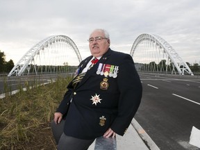 President of the Royal Canadian Legion/Barrhaven, Ernie Hughes poses for a portrait near the Strandherd-Armstrong Bridge in Ottawa, July 20, 2014.