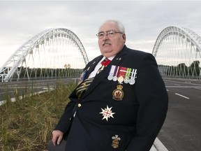 President of the Royal Canadian Legion/Barrhaven, Ernie Hughes poses for a portrait near the Strandherd-Armstrong Bridge in Ottawa, July 20, 2014.