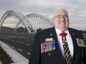 President of the Royal Canadian Legion/Barrhaven, Ernie Hughes poses for a portrait near the Strandherd-Armstrong Bridge on Sunday, July 20, 2014.