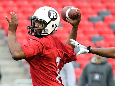 Quarterback Henry Burris unloads as the Ottawa Redblacks have their first practice at home since losing their opening season game against Winnipeg.