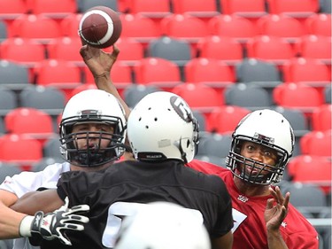 Quarterback Henry Burris unloads as the Ottawa Redblacks have their first practice at home since losing their opening season game against Winnipeg.