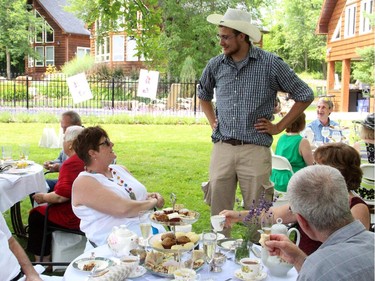 Ryan Hreljac mingled with all the guests of a charity tea party held Sunday, July 20, 2014, in Plaisance, Que. in support of a charity he founded, Ryan's Well Foundation.