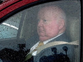 Conservative Senator Mike Duffy leaves Parliament Hill, in Ottawa, in a June 6, 2013 photo.