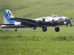 "Sentimental Journey", a Second World War B-17 Flying Fortress, lands at Gatineau airport on Monday, July 7, 2014.