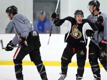 Shane Prince celebrates a goal from his "team" at the Senators development camp, which had their final 3 on 3 tournament Monday July 7, 2014 at the Bell Sensplex.
