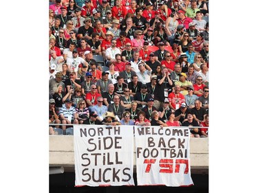 South side cheering against North Side during the franchise home opener of the Ottawa Redblacks against the Toronto Argonauts at TD Place on Friday, July 18, 2014.