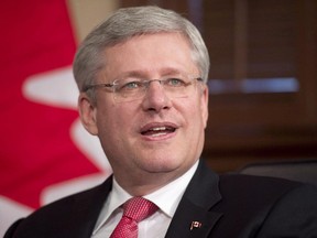 Prime Minister Stephen Harper speaks to the media in his office in Ottawa, Thursday June 26, 2014. Terrorists are deliberately placing people in the path of an Israeli offensive aimed at stopping rocket attacks from Gaza, says Harper