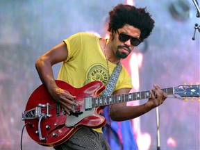 Tash Neal, from London Souls, rocks the Blacksheep stage Saturday, July 5, 2014 - day three of Bluesfest at LeBreton Flats.