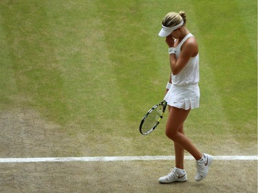 Canada's Eugenie Bouchard reacts to missing a point to Czech Republic's Petra Kvitova during their women's singles final match on day twelve of the 2014 Wimbledon Championships at The All England Tennis Club in Wimbledon, southwest London, on July 5, 2014.