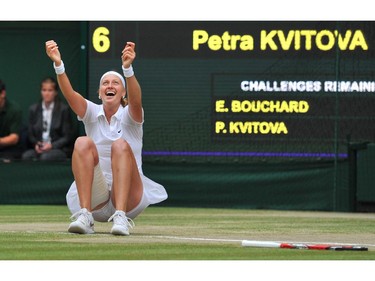 Czech Republic's Petra Kvitova celebrates after winning the women's singles final match against Canada's Eugenie Bouchard on day twelve of  the 2014 Wimbledon Championships at The All England Tennis Club in Wimbledon, southwest London, on July 5, 2014. Kvitova stormed to her second Wimbledon title in the shortest women's final at the All England Club since 1983 as the Czech sixth seed crushed Canada's Eugenie Bouchard 6-3, 6-0.