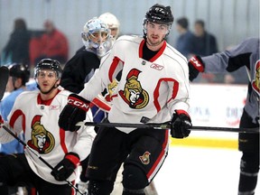 The big Ben Harpur, centre, was also at the Senators development camp, which had their final 3 on 3 tournament Monday July 7, 2014 at the Bell Sensplex.