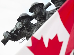 The Canadian flag flies in front of the National War Memorial Tuesday November 5, 2013 in Ottawa.