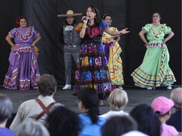 The Mexican dance group Aguila O Sol performs at the Carnival of Cultures at City Hall in Ottawa on Saturday, July 5, 2014.