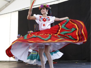 The Mexican dance group Aguila O Sol performs at the Carnival of Cultures at City Hall in Ottawa on Saturday, July 5, 2014.