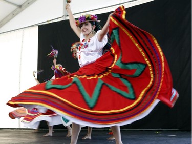 The Mexican dance group Aguila O Sol performs at the Carnival of Cultures at City Hall in Ottawa on Saturday, July 5, 2014.