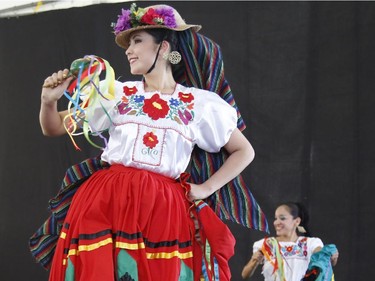 The Mexican dance group Aguila O Sol performs at the Carnival of Cultures at City Hall in Ottawa on Saturday, July 5, 2014.