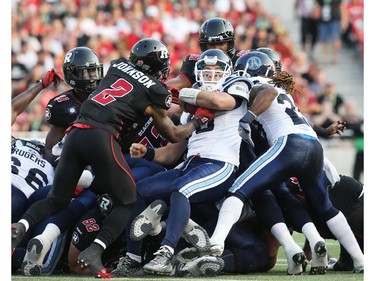 The Ottawa Redblacks tackled Mitchell Gale of the Toronto Argonauts at TD Place in Ottawa during the franchise home opener of the Redblacks on Friday, July 18, 2014.
