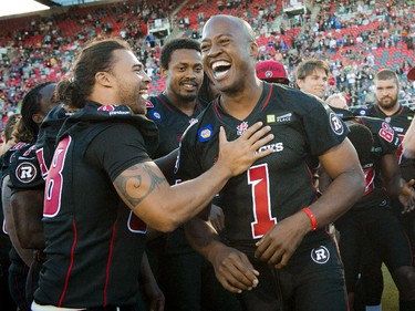 The Redblack show support for #1 Henry Burris at the official opening of TD Place at Lansdowne Wednesday July 9. 2014.