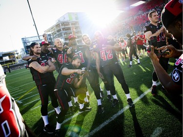 The Redblacks loved their selfies at the official opening of TD Place at Lansdowne Wednesday July 9. 2014.