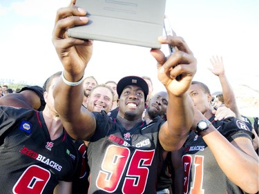 The Redblacks loved their selfies at the official opening of TD Place at Lansdowne Wednesday July 9. 2014.