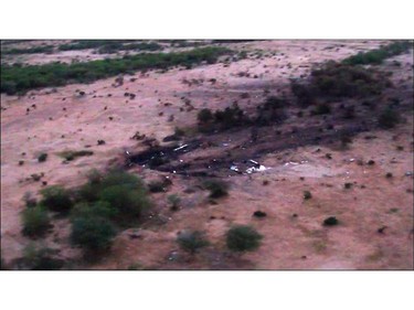 This photo provided Friday, July 25, 2014 by the French army shows the site of the plane crash in Mali. French soldiers secured a black box from the Air Algerie wreckage site in a desolate region of restive northern Mali on Friday, the French president said. Terrorism hasn't been ruled out as a cause, although officials say the most likely reason for the catastrophe that killed all onboard is bad weather. At least 116 people were killed in Thursday's disaster, nearly half of whom were French.