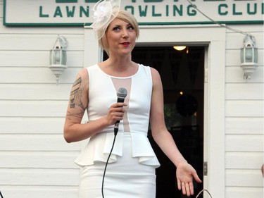 Tiffany MacLellan welcomes the crowd to the Wednesday, July 2, 2014 kick off of the Lawn Summer Nights event for cystic fibrosis, being held at the Elmdale Lawn Bowling Club over four evenings throughout July.