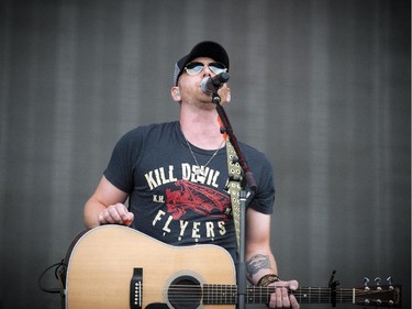 Tim Hicks performed with his band on the Bell Stage Sunday July 6, 2014 at Bluesfest held at LeBreton Flats. (Ashley Fraser / Ottawa Citizen)