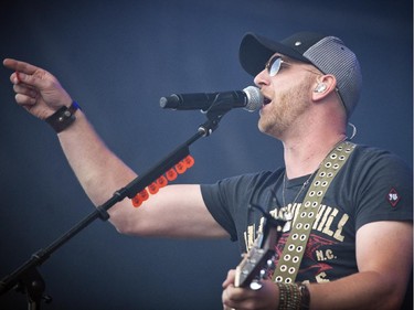 Tim Hicks performed with his band on the Bell Stage Sunday July 6, 2014 at Bluesfest held at LeBreton Flats.