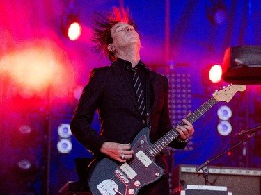Troy Van Leeuwen of the band Queens of the Stone Age on the Claridge Stage at Bluesfest.