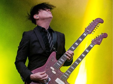 Troy Van Leeuwen of the band Queens of the Stone Age on the Claridge Stage at Bluesfest.