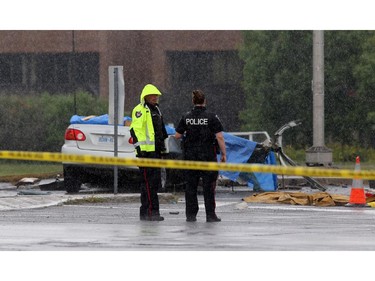 Two are dead after two cars collided at the intersection of March Rd. and Carling Ave. in Kanata (Ottawa), Sunday, July 27, 2014.