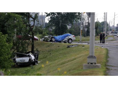 Two are dead after two cars collided at the intersection of March Rd. and Carling Ave. in Kanata (Ottawa), Sunday, July 27, 2014.